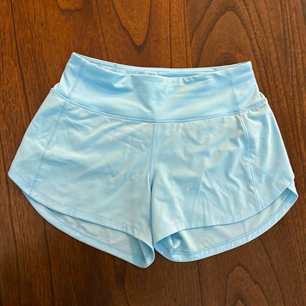 Lululemon blue chill speed-up mid rise 4 inch shorts. Size 4